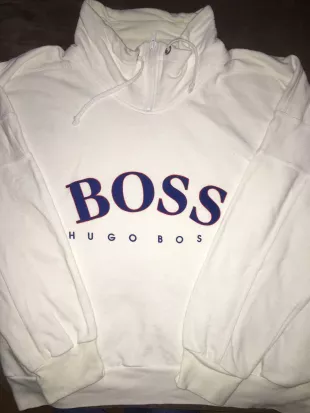 Åben Tilsætningsstof dynamisk The white 1/4 zip Hugo Boss sweatshirt worn by Rocky Balboa (Sylvester  Stallone) in the movie Rocky IV | Spotern