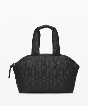 Quilted Embrace Tote Bag