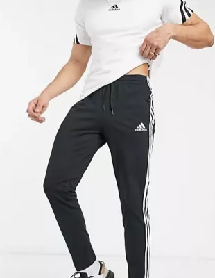 Sportswear Essential 3 Stripe Trackies in Black