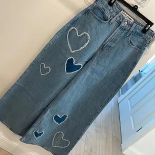 Social Tourist Highest Rise Baggy Heart Patch Jeans worn by Charli D'Amelio seen in The D'Amelio Show | Spotern