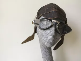 Antique goggles and leather hat from the 1920s.