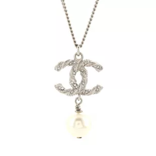 Chanel CC Pearl Pendant Necklace Metal with Crystals and Faux Pearl worn by  Emma Hernan as seen in Selling Sunset (S06E02)