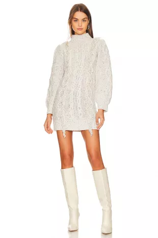 Line and outlet dot fringe sweater