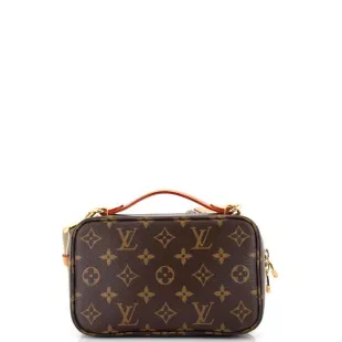 Louis Vuitton Monogram Embossed Utility Crossbody worn by Mary