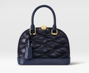 Louis Vuitton Loop Hobo Monogram Bag worn by Ana de Armas in New