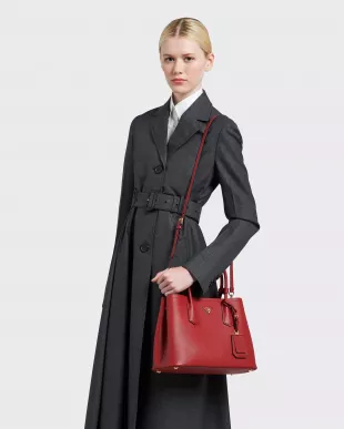Prada Small Saffiano Leather Double Prada Bag worn by Odeen Eccleston as  seen in Listing Large Season 1 Episode 2
