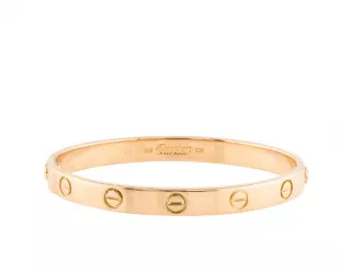 Cartier Love Yellow Gold Bracelet worn by Meghan Markle at Santa