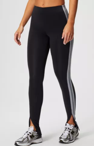 Fabletics Motion365+ Twisted Stripe Pull On Pant worn by Ciara Miller as  seen in Summer House (S08E02)