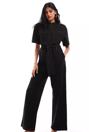Wide Leg Stretch Jumpsuit With Tie Waist And Utility Pockets In Black