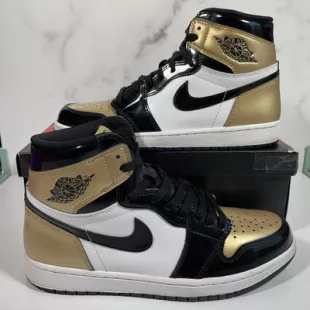 Jordan White/Black/Gold High Top Sneakers