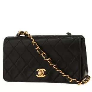 Sac porté épaule ou main Chanel Mademoiselle en cuir matelassé noir