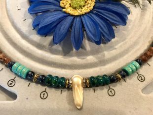 Black Panther Nakia inspired necklace, blue, turquoise, green, silver and gold colored, wood, glass, plastic, metal beads,