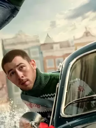 A Very Jonas Christmas Movie 2025 Nick Jonas Green Sweater