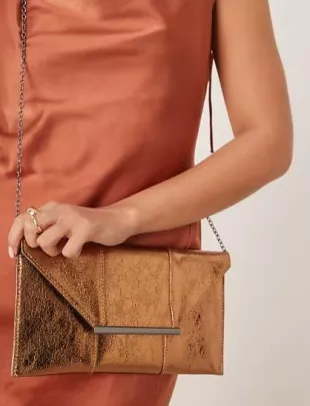 True Decadence Metallic clutch bag in bronze