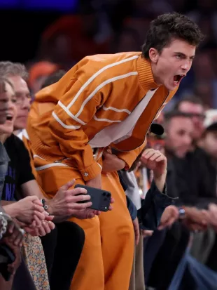 Timothee Chalamet 2026 NBA Finals Orange Tracksuit
