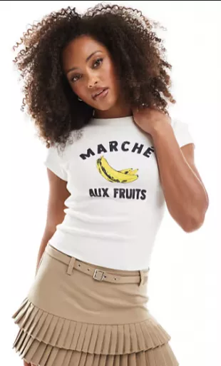 Baby tee with banana graphic in cream