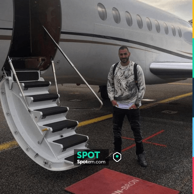 The pair of sneakers high grey Balenciaga Karim Benzema in front of a plane  on Instagram | Spotern