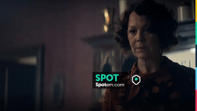 La broche triangulaire de Polly Gray (Helen McCrory) dans Peaky