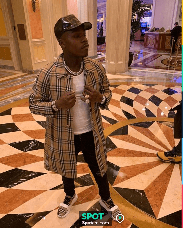 dababy wearing 🧢 Bape × Coca-Cola Mesh Cap ($140) 🧥 Burberry Checked  Jacket ($990) 🎗 Louis Vuitton Chain Belt ($1080) 👖 Amiri Stack Jeans…