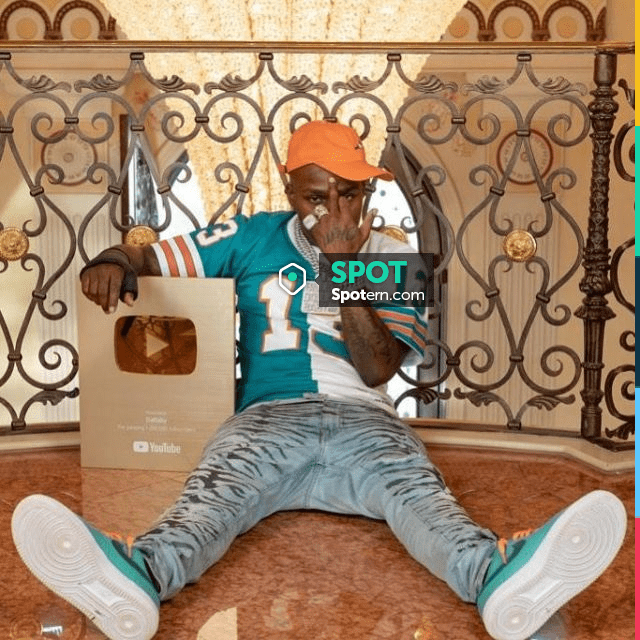 Mitchell & Ness Dolphins Split Home and Away Jersey of DaBaby on the  Instagram account @dababy