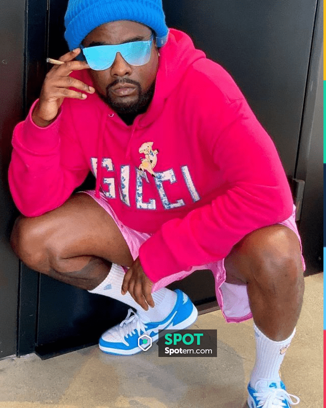 Sneakers nike air jordan low blue and white worn by Wale on Oakley Sunglasses of Wale on the Instagram account @wale