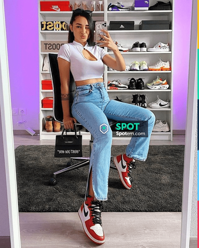 The jeans split at the bottom worn by Maile Akln on his ...