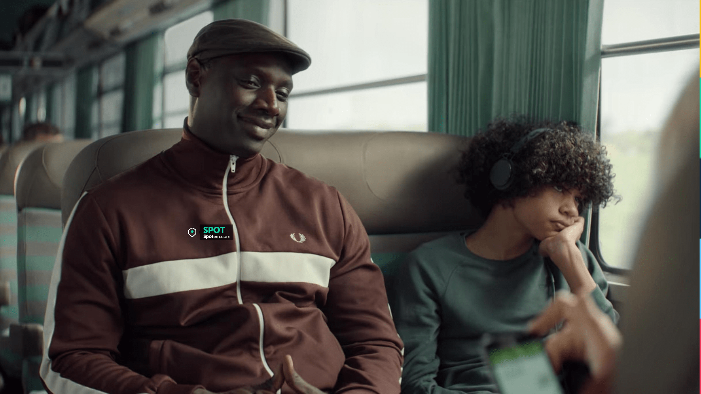 Fred Perry Track jacket worn by Assane (Omar Sy) as seen in Lupin