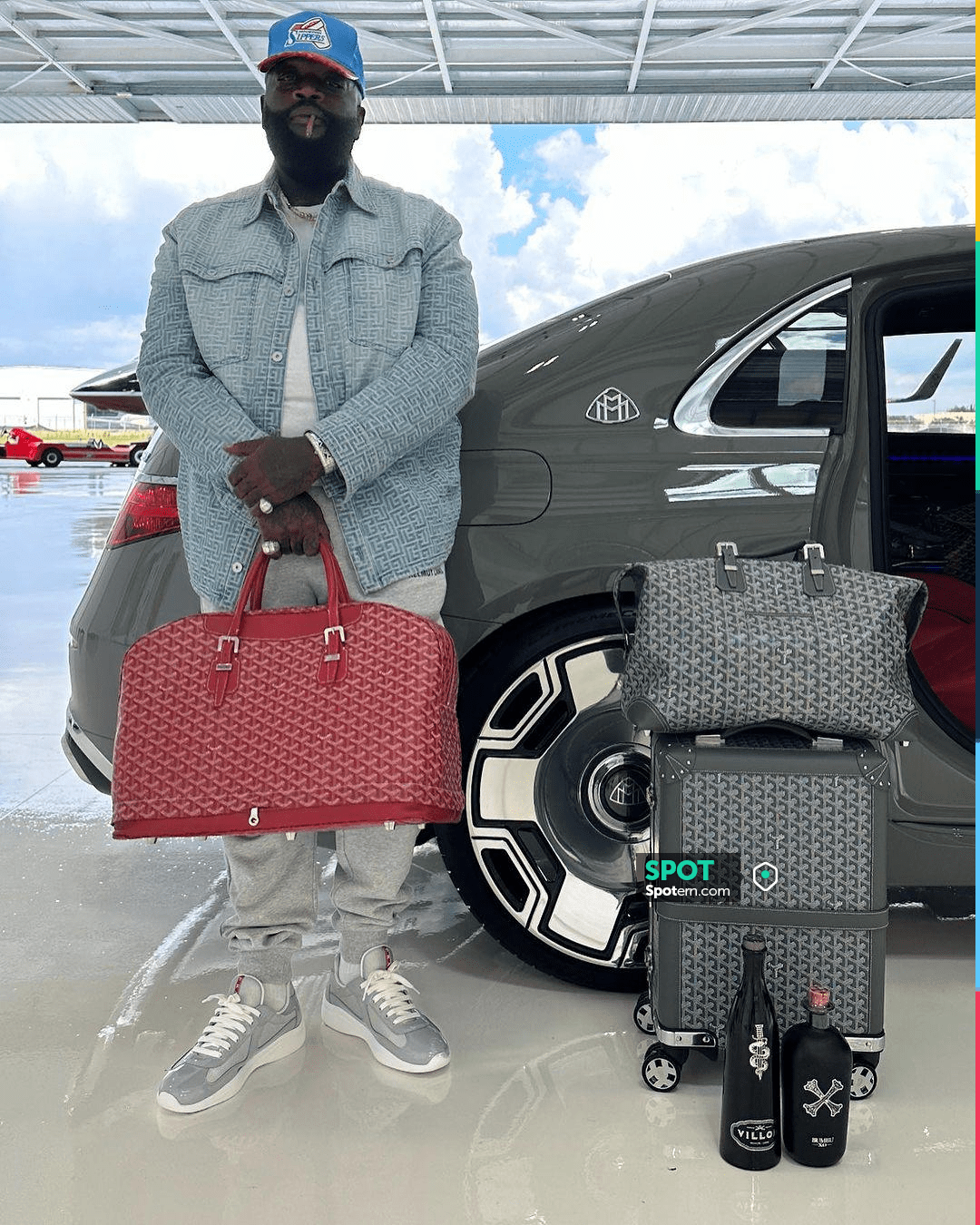 Goyard Grey Bourget Rolling Suitcase worn by Rick Ross on the
