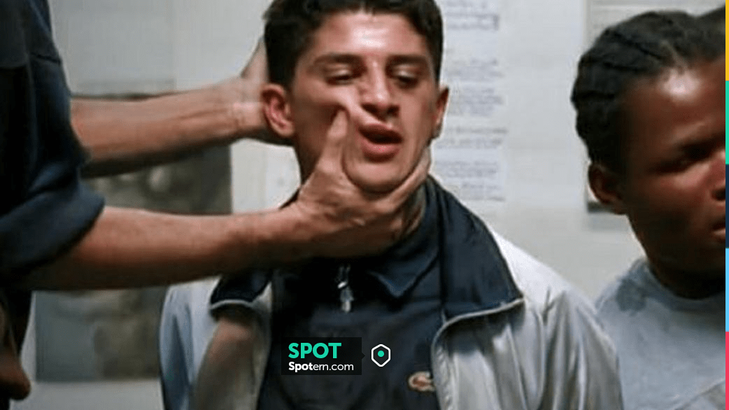 The navy blue Lacoste polo shirt worn by Saïd (Saïd Taghmaoui) in the ...