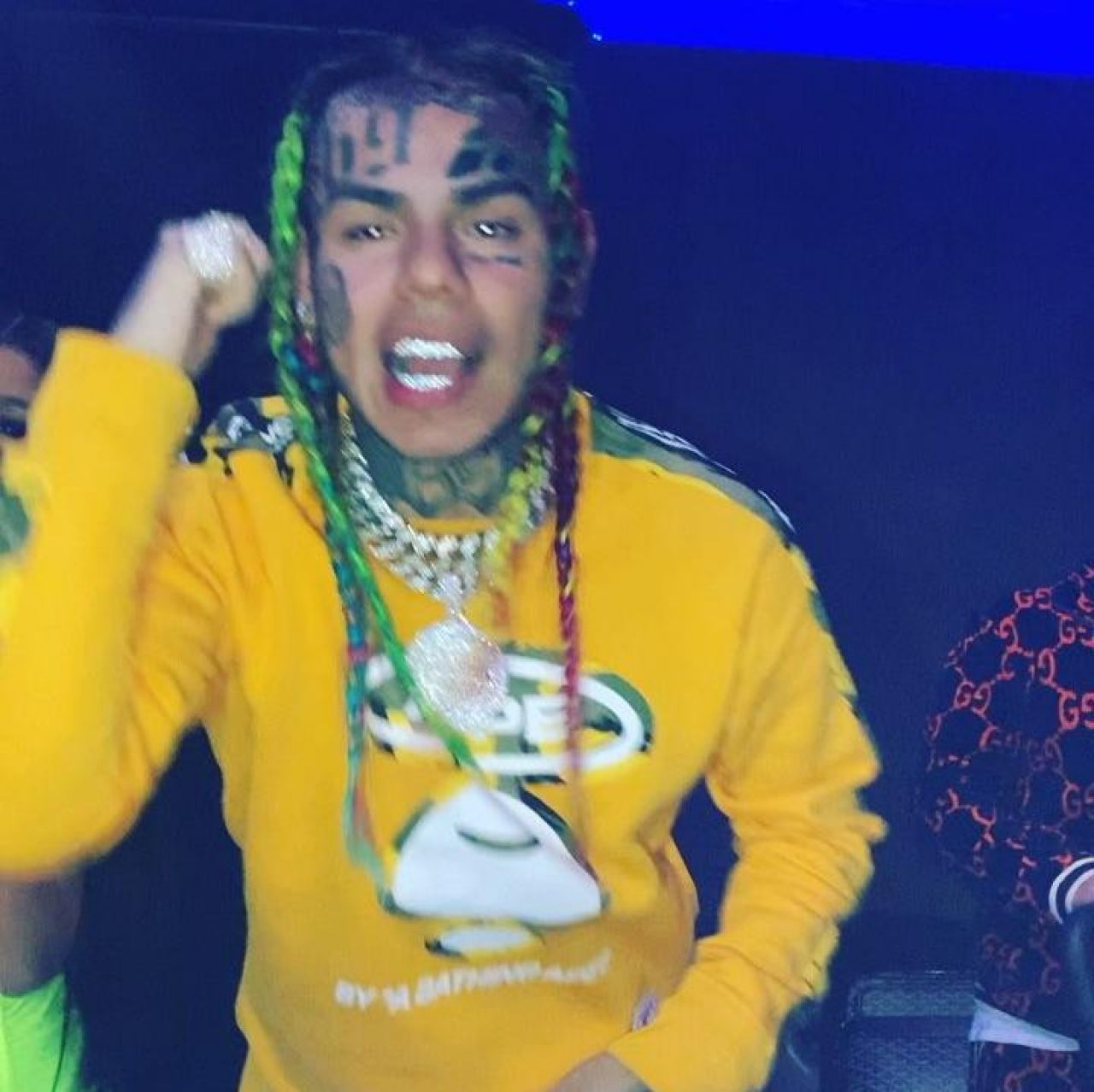6ix9ine's yellow sweater by Bape as seen on his Instagram accoutn ...