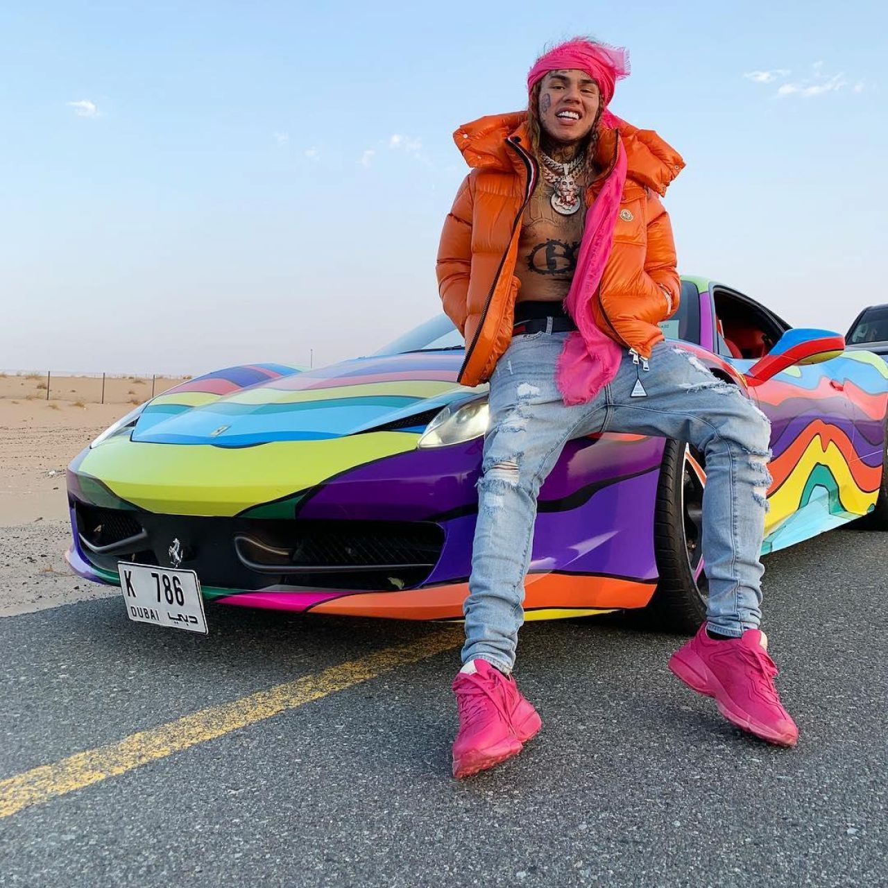 Moncler Padded Hooded Orange Jacket worn by 6ix9ine on his Instagram