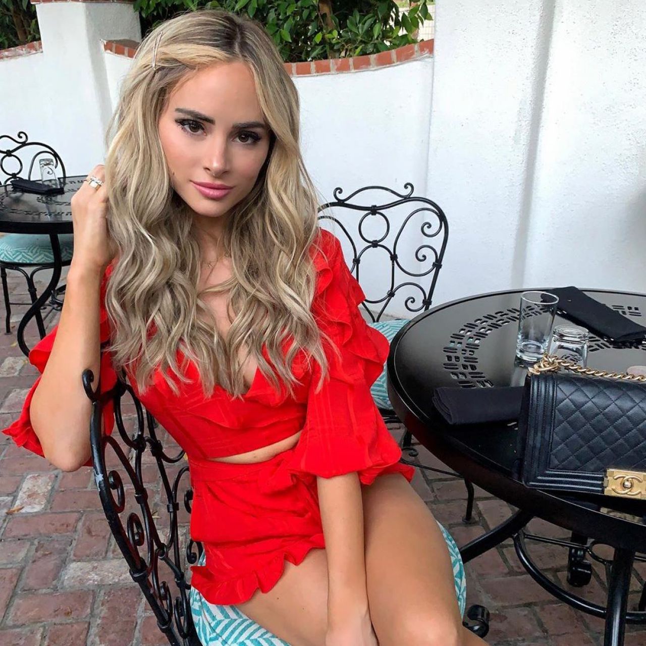 Majorelle Enzo Romper in Red worn by Amanda Stanton on her Instagram accoun...