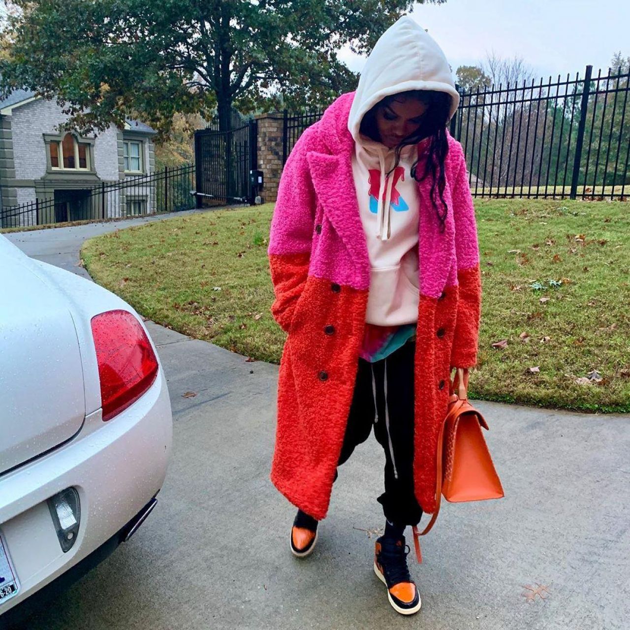 The coat pink, and orange of Teyana Taylor on the account Instagram of @tey...