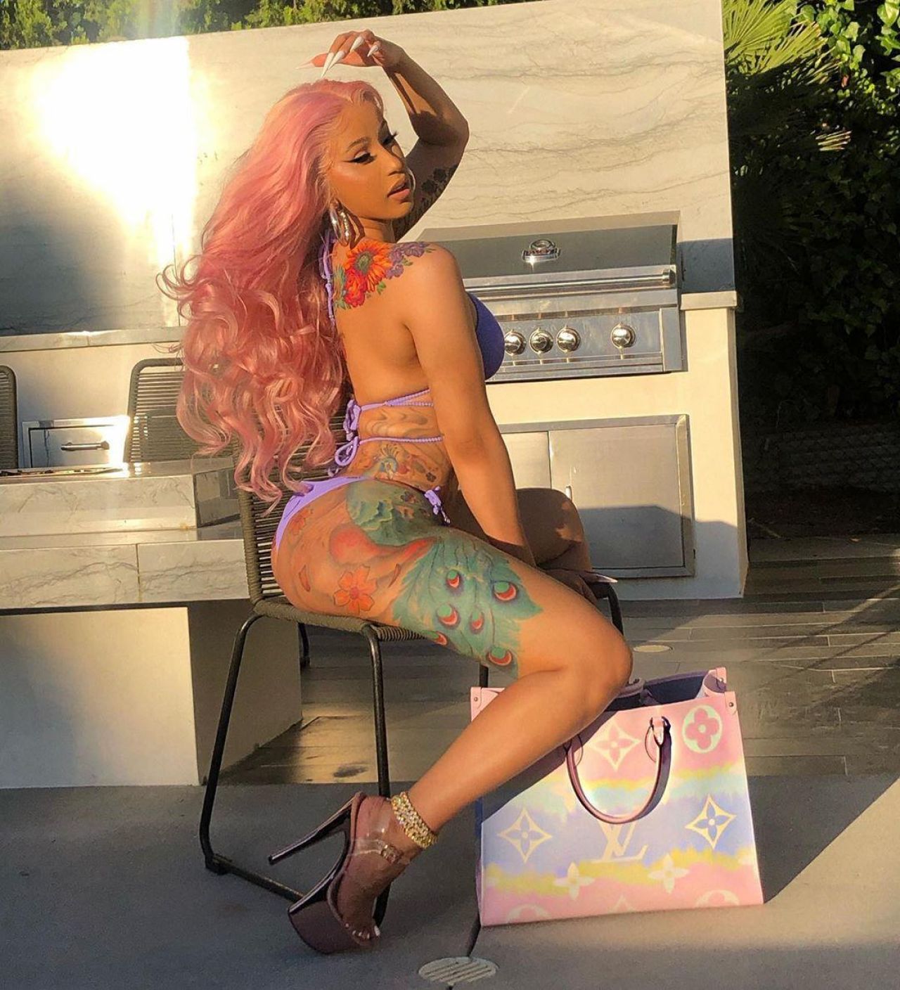 Louis vuitton Pink Monogram Handbag of Cardi B on the Instagram account @ia...