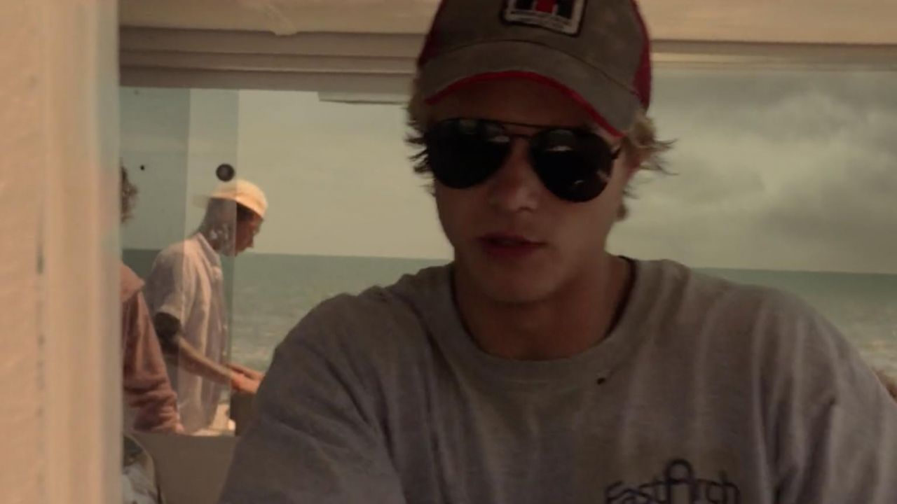 Red and grey cap worn by JJ (Rudy Pankow) in Outer Banks (S01E03) Spotern