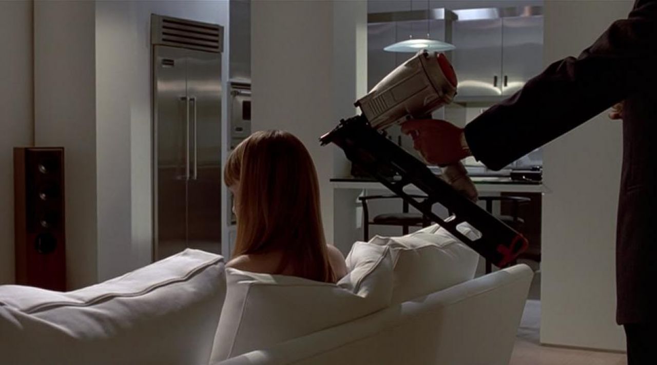 The white sofa of Patrick Bateman (Christian Bale) in American Psycho.