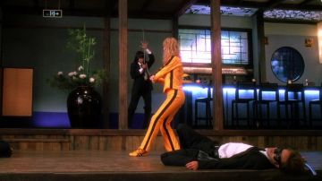 Las zapatillas amarillas Asics Tai Chi "Bruce Lee" de Black Mamba (Uma Thurman) en Kill Bill vol.1