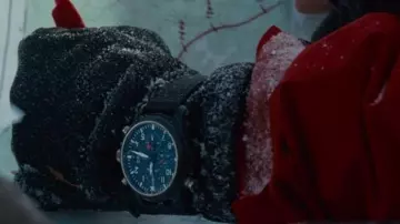 The IWC watch with blue dial worn by Aaron Cross (Jeremy Renner) in the film The Bourne Legacy