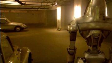 The DS Citroen in a car park under ground of caprica (mid left)