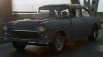 The Chevy 210 in Macadam two-lane