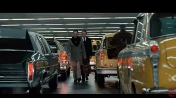 Le manteau vintage de Gaëtan Zampa (Gilles Lellouche) dans le film La French