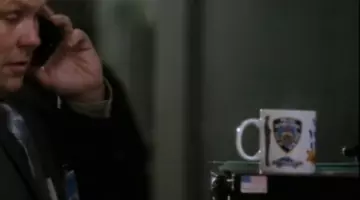 The mug of the police of NY in Person of Interest
