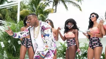 The Navy & Floral Monroe Bikini dancers in the clip Rake It Up Yo Gotti