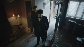 The coat type overcoat black Arthur Shelby Junior (Paul Anderson) in Peaky Blinders Season 4 Episode 4