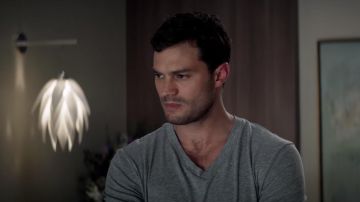 The gray t-shirt V-neck collar, Christian Grey (Jamie Dornan) in Fifty shades lighter