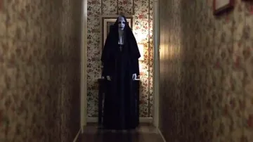 The costume of the nun demonic / Valak the demon (Bonnie Aarons) in the movie Conjuring 2