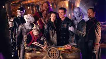 La réplique du badge de communication dans la série Farscape
