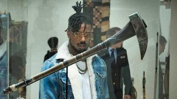 The round glasses of Erik Killmonger (Michael B. Jordan) in a Black Panther
