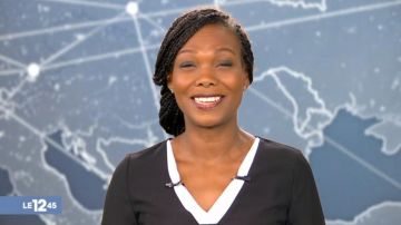 The black top and white V-neck Kareen Guiock in The log 12:45 19/03/2018