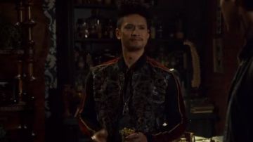 Bomber black with side stripes red worn by Magnus Bane (Harry Shum Jr.) in Shadowhunters S03E01